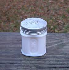 Opaque glass originated in 16th century venice and came in a variety of colors, including white, pink, yellow, blue, and brown. Early 1930s Vintage Pond S Cold Cream Embossed Milk Glass Jar With Embossed Aluminum Lid Contents Pond S Extract Co Vintage Vanity Decor Ponds Cold Cream Vintage Vanity Cold Cream