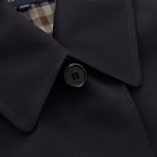 Crafted from a showerproof cotton blend, a classic raincoat. Aquascutum Berkeley Navy Raincoat