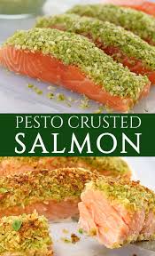 Pesto Salmon Baked In The Oven A Quick And Healthy Dinner Done In No Time Basil Pesto Makes A Perfect P Pesto Salmon Pesto Salmon Baked Fish Recipes Healthy