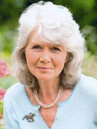 Here's a couple of photos from The Royal Variety Performance 2001( I think  that was the date) I'm being presented to Her Majesty by our producer Jeff  Thacker. Cilla, Barbara Windsor and