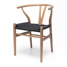 The inky color covers both the solid wood frame and woven seat, making this wishbone chair a perfect complement to contemporary spaces. Wishbone Dining Chair Oak With Black Seat Furniture By Design Fbd