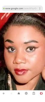 Who was the lady vocalist singing with Longwe Twala and Bongani Fassie in  the New Age Group?