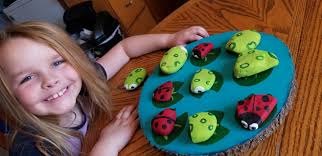 Tic-tac-toe game made with painted rocks