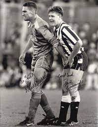 Vinnie jones was a professional soccer player who currently holds the record for fastest yellow card (3 seconds). Vinnie Jones And Paul Gascoigne
