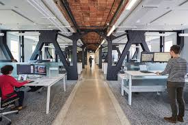 In Hamilton A Heritage Building Restored By Mccallumsather Also Serves As Its Agile New Home Cool Office Space Cool Office Office Space