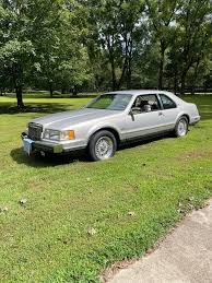 Image result for Silver 1990 Lincoln