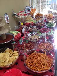 Graduation Chamoy Dessert Table With Peanuts Sabritones Duros Chips Fruit Chamoy Apples Pelones Mexican Candy Table Mexican Dessert Table Mexican Snacks