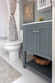 Rustic Chic Beach House With Red And Gray Accents Beach House Bathroom Chic Beach House Rustic Beach House
