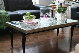 Paint the drawer that you just made with the silver paint, if you give it a better primer beforehand, you will prevent the wood from absorbing the silver paint unevenly. Diy Mirrored Coffee Table Julie Loves Home
