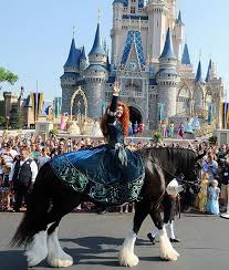 Brave S Merida Rides In The Mothersday Festivities On Her Gorgeous Horse Angus At The Waltdisneyworld Disney Horses Disney Parade Disney Face Characters