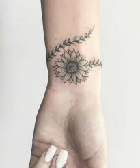 Devastatingly Stunning Flower Wrist Tattoos For Girls Cool Wrist Tattoos Wrist Tattoos Girls Flower Wrist Tattoos