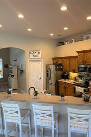 Aims to light the entire area offers a good and comfortable visibility i like to use 2watt/square foot in calculating the number of lights for the general kitchen recessed lighting layout and dimming system to do the job. Replace Lighting Before After Conversion Photos The Can Converter