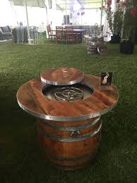 Www Smokinbarrelworks Com Please Read The Barrel Fire Table Reclaimed Model Is Our Signature Piece The Barrel Fire Pit Wine Barrel Fire Pit Wine Barrel Table