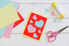 How to make simple greeting card, diy greeting card making ideas for beginners, mother's day 2018. Valentines Day Or Mothers Day Card With Pink And Blue Hearts Scissors Glue Stick Colored Paper Sheets On A Wooden Table Stock Photo Image Of Craft Happy 106760212