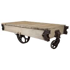 We have three similar table available, all with slight variations. Vintage Industrial Cart Coffee Table For Sale At 1stdibs