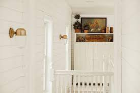 If you are going higher, just be sure to consider the window frame height. Cheap And Affordable Hallway Wall Sconces Liz Marie Blog