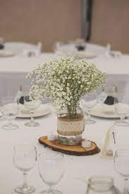 Baby S Breath In Mason Jars With Burlap And Lace Wedding Centerpieces Mason Jars Bridal Shower Centerpieces Diy Bridal Shower Rustic