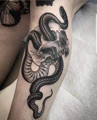 Snake And Skull By Ash Timlin At Lost Boys Tattoo In Toronto Boy Tattoos Tattoos Snake Tattoo Design