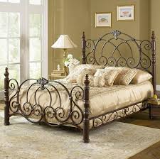The rod continues up and then the cross rods rest atop. Romance The Bedroom With A Decorative Wrought Iron Bed Artisan Crafted Iron Furnishings And Decor Blog