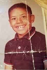 Hello everyone, is there anyone who is able to help restore this photo or  improve it at all please. My father in law is the young boy aged 5 years  now in