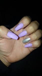 Coffin nails are the most popular style for making a statement. Purple Silver Coffin Nails Purple Acrylic Nails Purple And Silver Nails Womens Nails