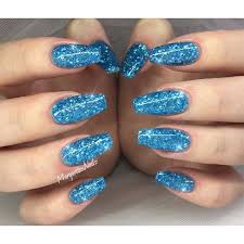 Whilst fake nails cover the whole fingernail, acrylic nails are extensions placed on the end to help them look longer and make them easier to shape. Blue Glitter Nails By Margaritasnailz From Nail Art Gallery Blue Glitter Nails Glitter Nails Acrylic Glitter Nails