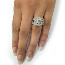 This dynamic wedding trio features an engagement ring and matching groom and bride wedding band. Pompeii3 3 Ct Diamond Engagement Wedding Cushion Halo Trio Wedding Ring Set White Gold