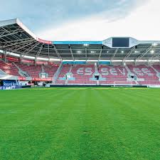 The club uniforms are red and green. Rainbow Stadium Zulte Waregem A Project Reference By Audac