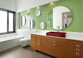 A wood floor and vanity give this city bathroom a warm and serene feeling. 20 Refreshing Bathrooms With A Splash Of Green
