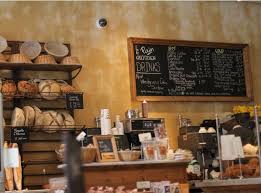 Its Actually The Wall Decor In This Bakery That I Love Rustic Bakery Decor Bakery Barn Kitchen