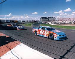 14 drivers have won one cup title and, as of the 2015 class, five are in the nascar hall of fame. Speed In Photographs Bobby Hamilton 43 Leads The Way In His Pontiac