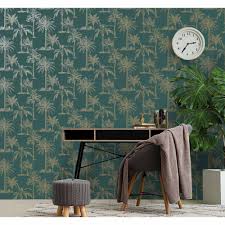 Abstract background textuer of shadows leaf on a concrete pattern with tropic summertime motif may be used as background texture, wrapping paper, textile, wallpaper design. Holden Decor Glistening Tropical Tree Metallic Teal Wallpaper Wilko