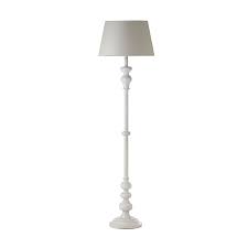 The white shade, angled down, complements the neutral. White Wood Floor Lamp Base Novocom Top