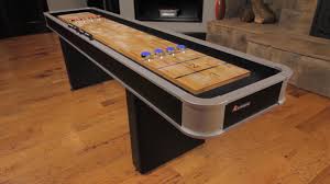 This is the table shuffleboard version. Atomic 9 Foot Shuffleboard Video Webstaurantstore