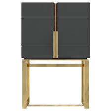 Van dyke's restorers offers a fine selection of supportive and robust brass railings and fittings to add the finishing touch to your restoration or home improvement project. Lloyd Bar Cabinet In Brass And Wood For Sale At 1stdibs