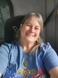 Who owns the yellow farmhouse