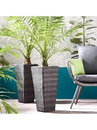 Shop matalan's range of plant pots & planters, including indoor and outdoor garden planters, herb planters and hanging planters. Set Of 2 Tall Rattan Effect Planters Brown Very Co Uk