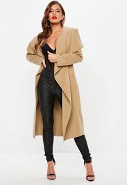 This camel coat is made with ponte, not wool. Missguided Synthetic Camel Oversized Waterfall Duster Coat In Natural Lyst