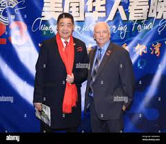 Irvine, California, USA. 28th January, 2023. TV host Joey Zhou and Dr. Mark  Rafter, CEO, Modern Day Marco Polo Enterprises, attending the Chinese  American Spring Festival Gala at the Irvine Barclay Theatre