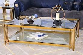 This coffee table rests on thick silver metal legs. Metal Coffee Tables