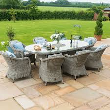Maze Rattan Oxford 8 Seater Oval Dining Set With Ice Bucket And Parasol Robert Dyas Finally Rattan Garden Furniture Round Patio Table Square Patio Table