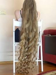 Wavy long layered blonde hair. Video Super Long Curly Hair In Chair Realrapunzels