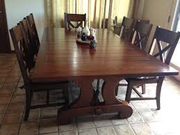 These sturdy hardwood chairs are a greatthese sturdy hardwood chairs are a great value, extremely comfortable and durable. Lourdes Plank Top Trestle Dining Table And X Back Dining Chairs Mortise Tenon