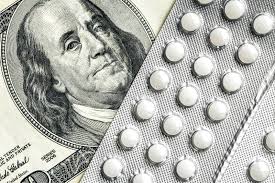 Dollar Bills among Blisters with Green Pills, Medicine Flat Lay, Benjamin  Franklin Stock Photo