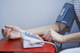 Image result for person having blood pressure taken