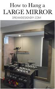 How To Hang A Large Wall Mirror Step By Step Tutorial Large Wall Mirror Gym Mirror Wall Home Gym Mirrors