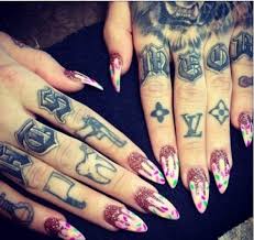 Unlike the more assertive and loud designs of men, girls prefer classy ones like simple quotes, floral, and so on. Louis Vuitton Tattoo Designs