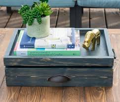 Use it as a decorative piece by placing a row of potted succulents alongside your current reads, or use it more traditionally as a way to serve guests their drinks and small snacks. Free Diy Plans To Build A Coffee Table Serving Tray With Drawer The Design Confidential