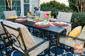 Place the vinyl ring in hot water for 5 minutes as this will make the vinyl pliable for inserting into the table top hole. Small Patio Decorating Ideas By Kelly Of View Along The Way Small Patio Decor Small Patio Patio Set With Umbrella