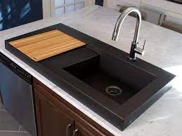 Some vessel sinks are partially recessed in a hole to allow the basin to have sturdy support. 10 Modern Kitchens With Beautiful Vessel Sinks